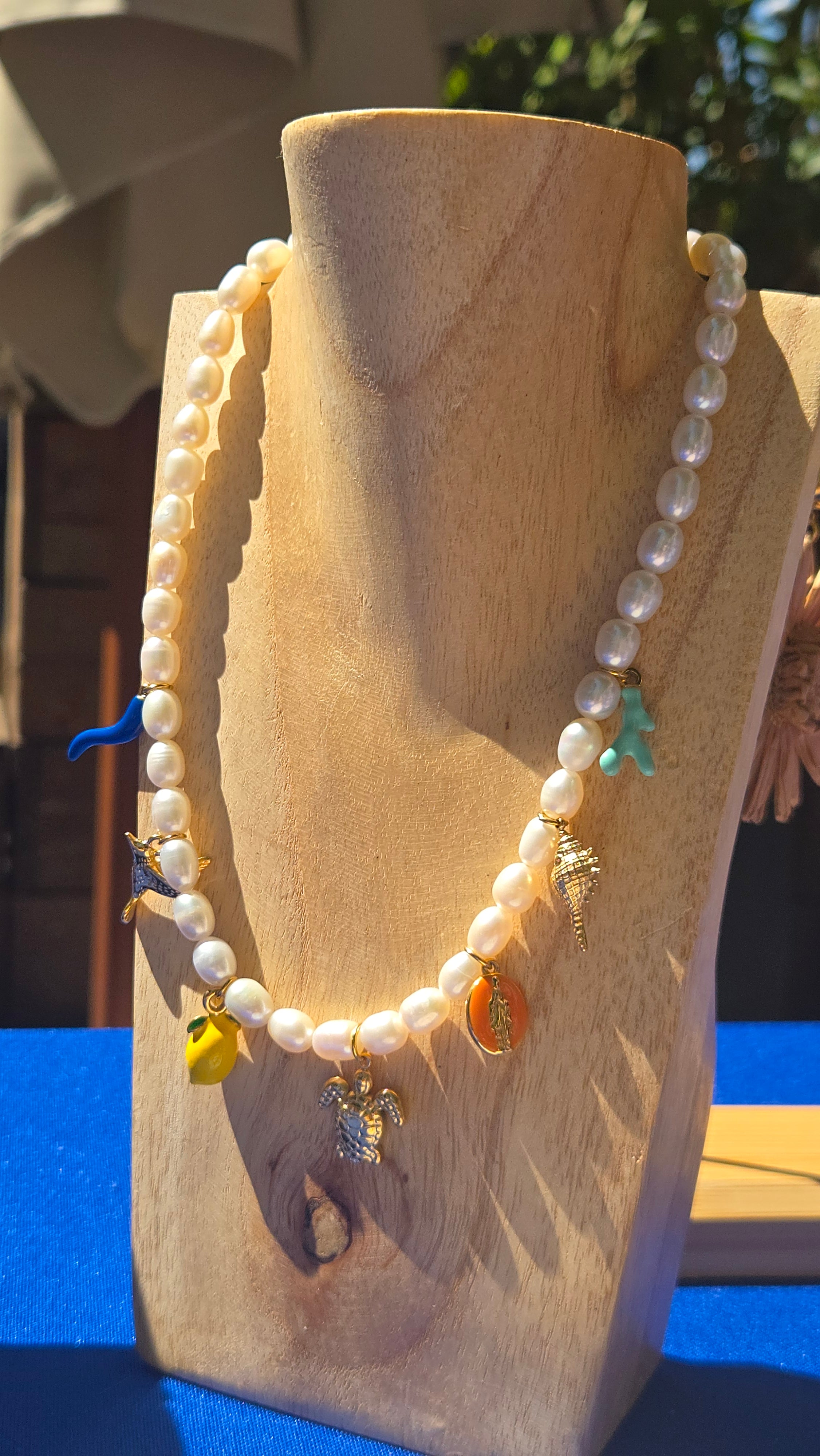 Collier à breloque en perle d'eau douce